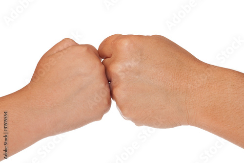 Fists of an adult and a child isolated on white