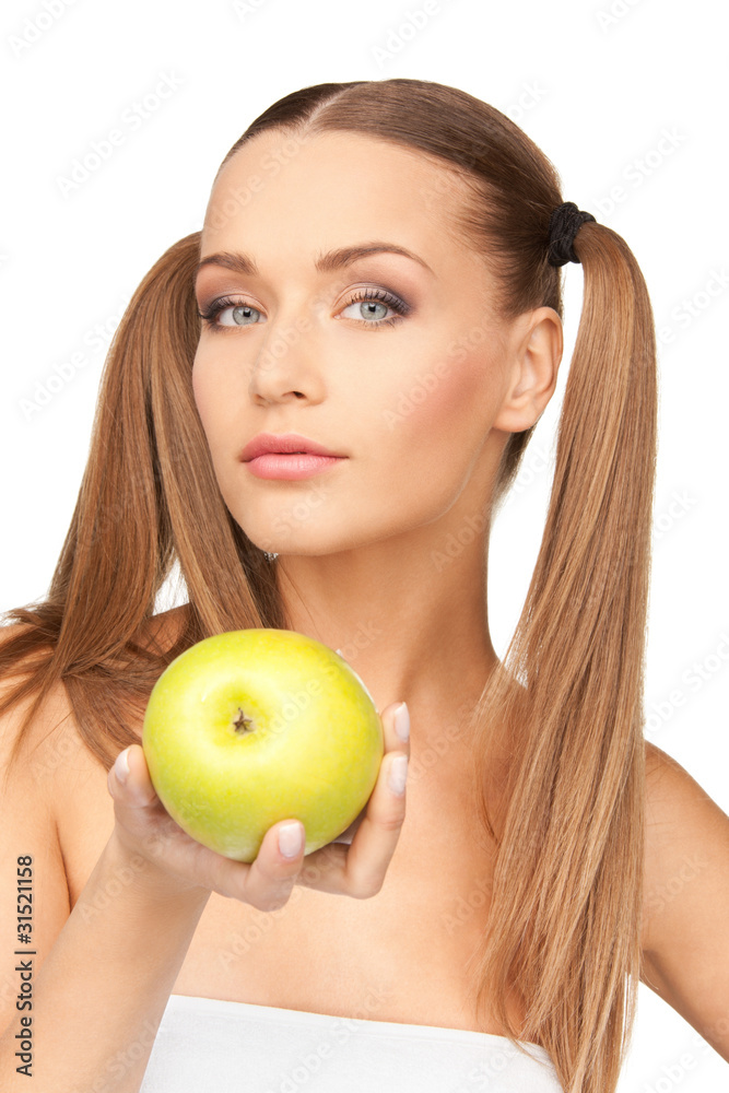 young beautiful woman with green apple young beautiful woman with green apple