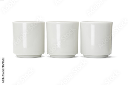 Three porcelain Chinese tea cups