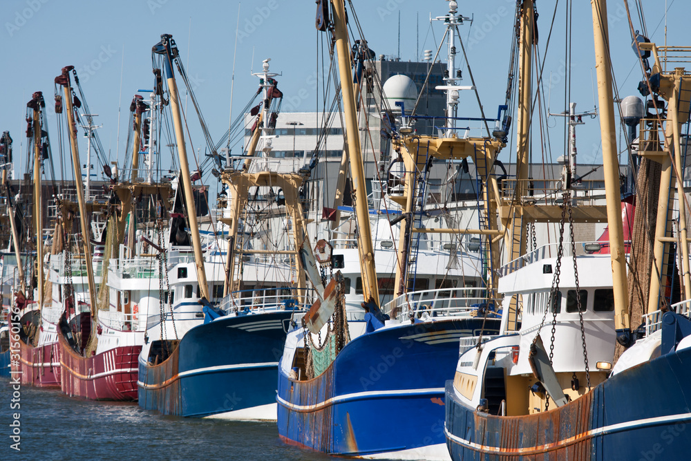 Dutch harbor with modern fishing cutters