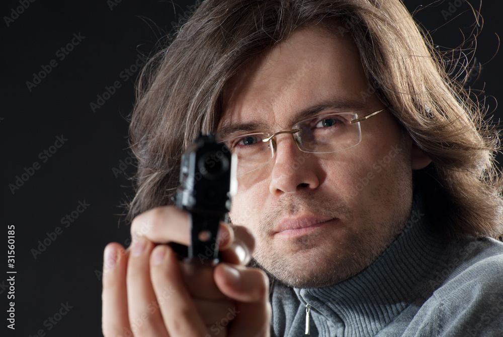 A man tacking aim A man tacking aim