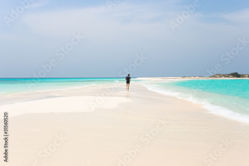 Man jogging on the beach