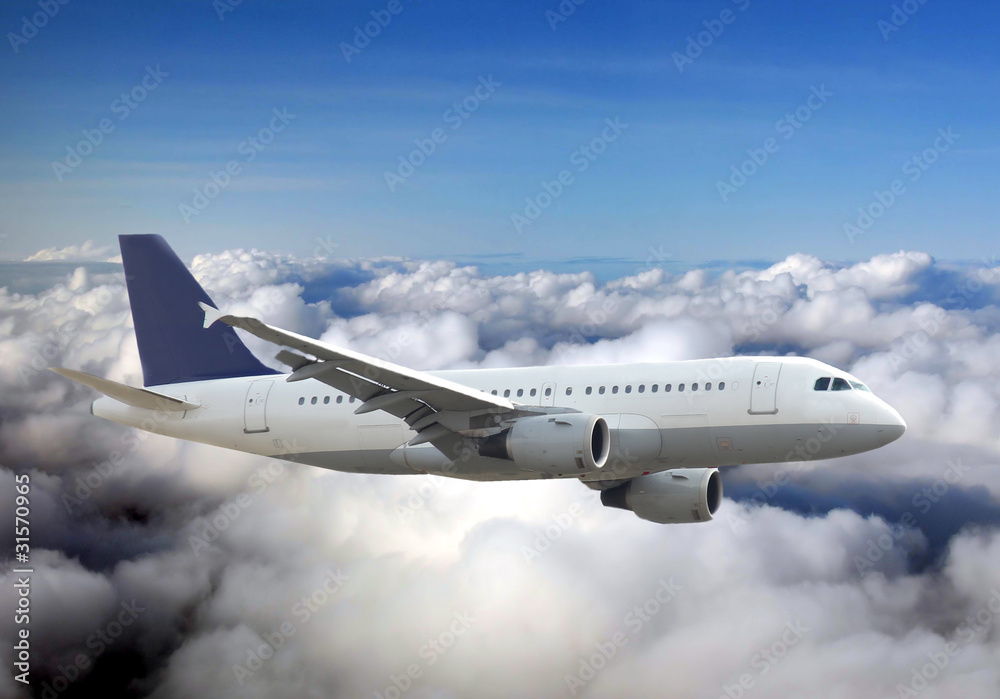 Obraz premium Airplane above sky