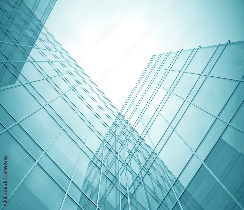 Obraz premium contemporary transparent textured wall of glass skyscraper in bu