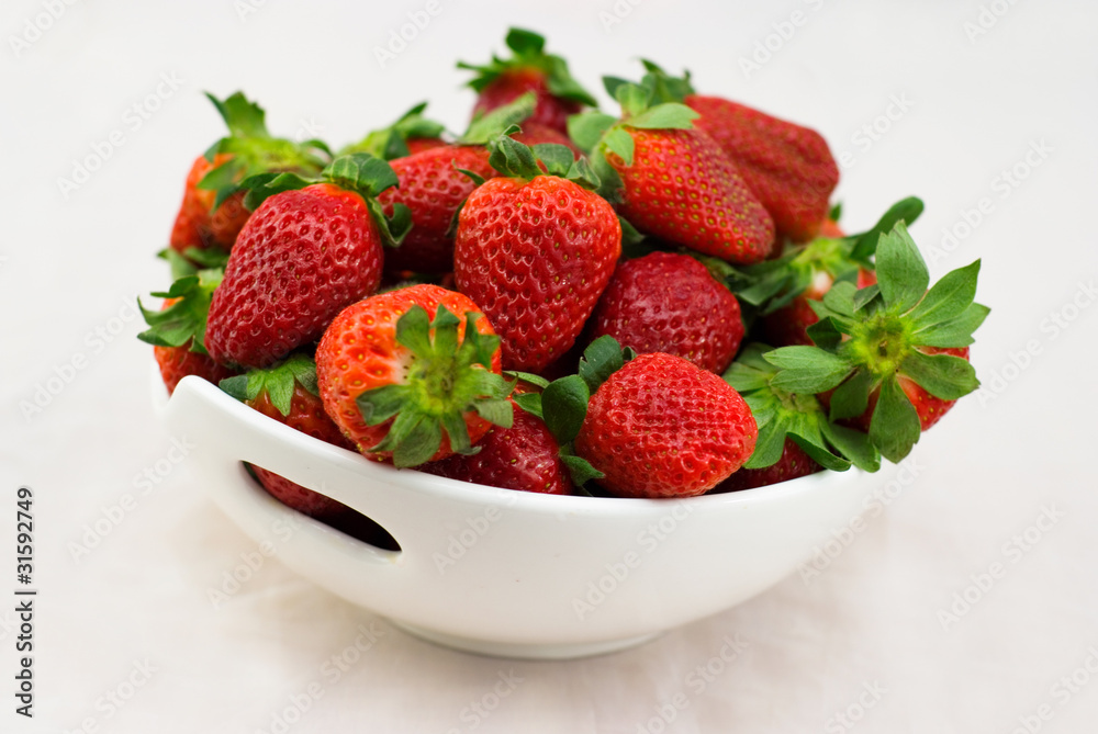 Fresh strawberries on a white background