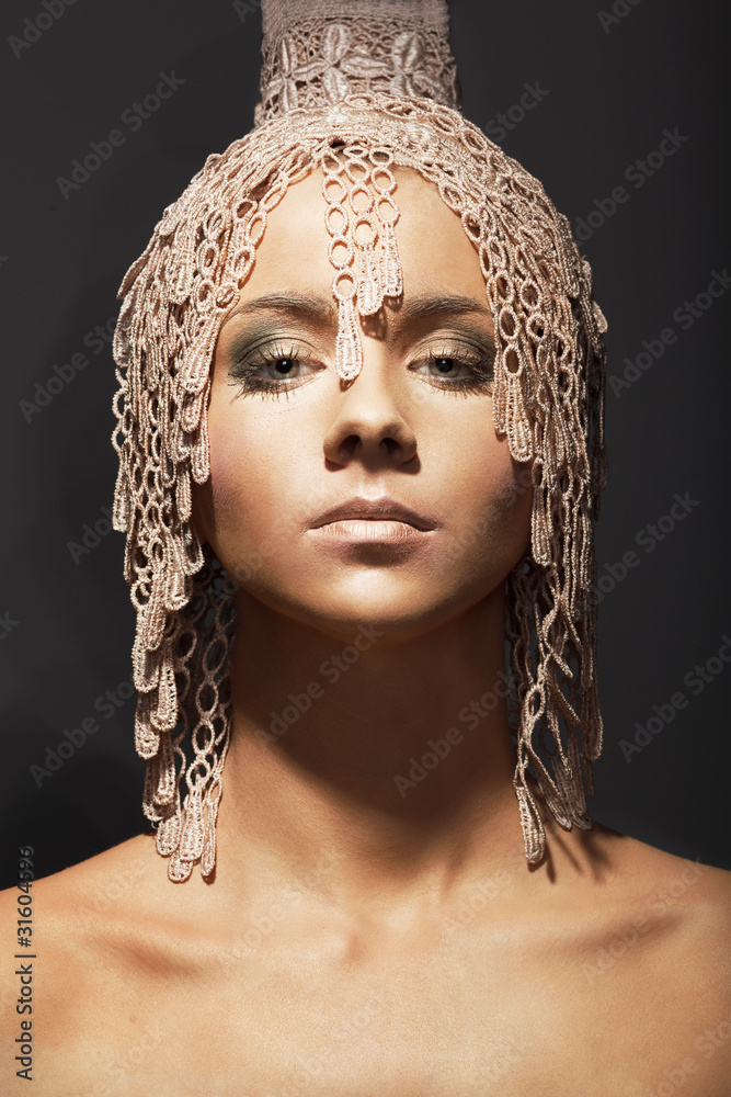 Portrait of elegant beautiful woman with modern curly hairstyle