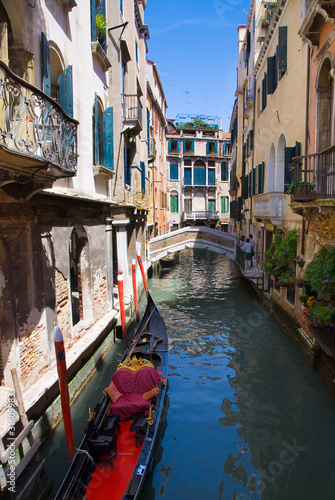 Venice canal with gondola, Italy © EMrpize