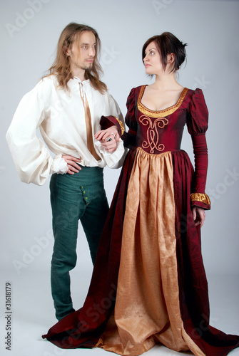 beautiful couple of medieval costumes