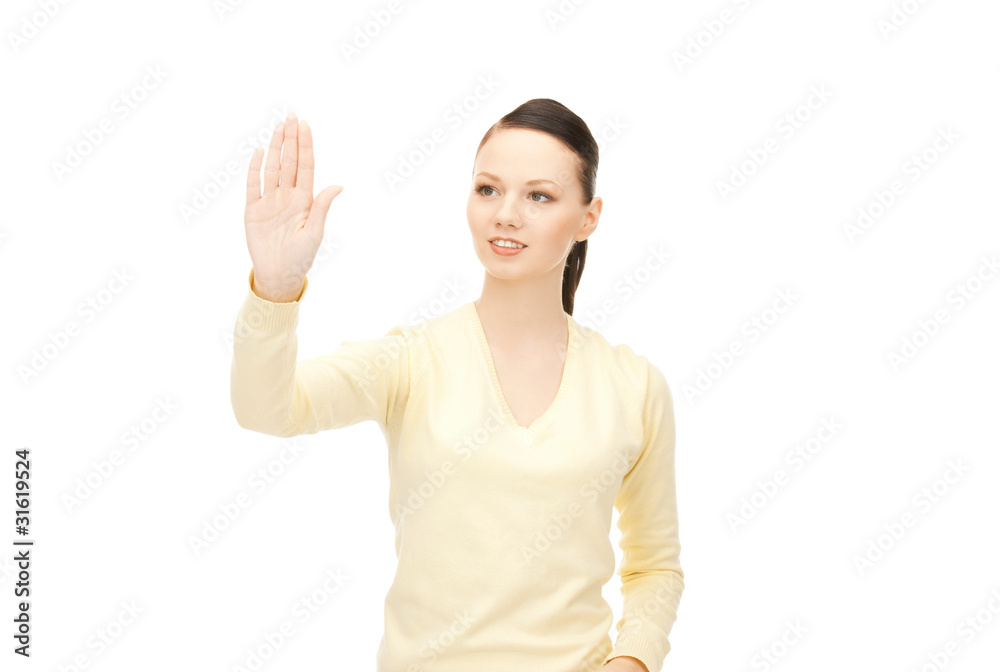 businesswoman working with something imaginary businesswoman working with something imaginary