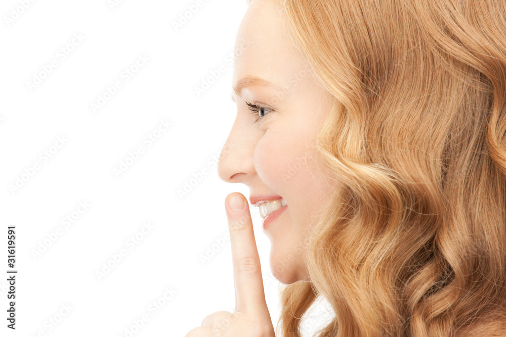 finger on lips
