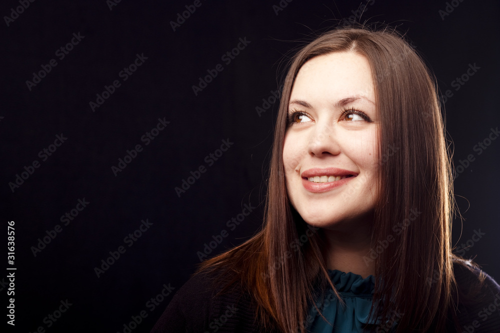 Smiling brunette on black Smiling brunette on black
