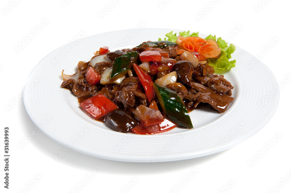 Roasted beef with vegetables on a plate