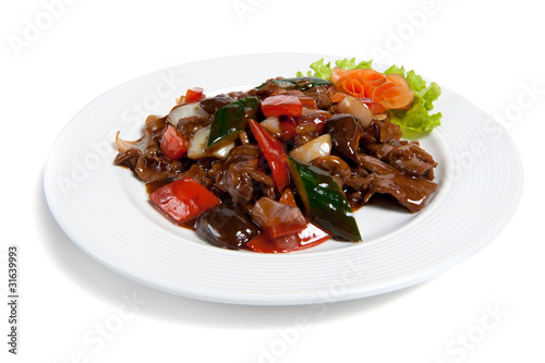 Roasted beef with vegetables on a plate