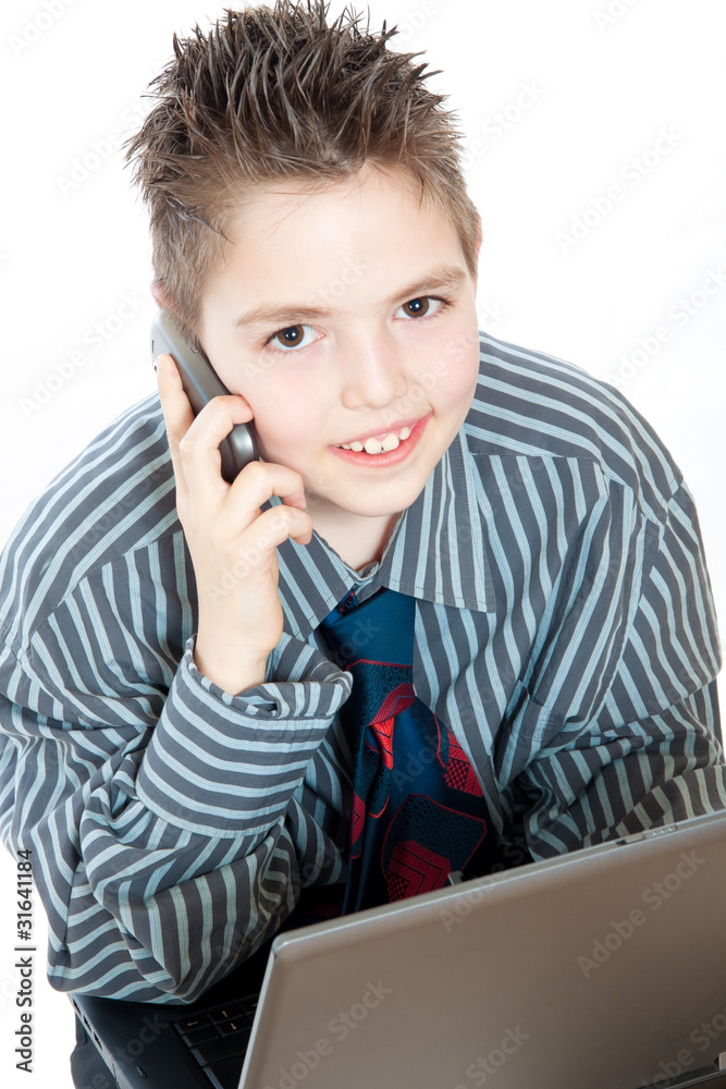 portrait of a business boy with mobile and laptop