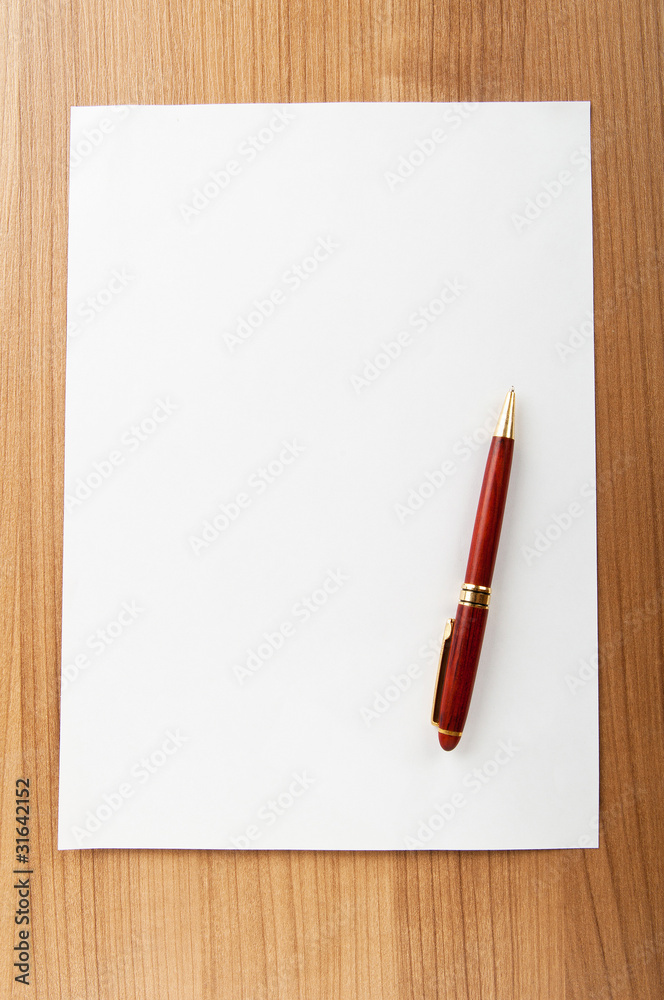Pen on the sheet of paper Pen on the sheet of paper