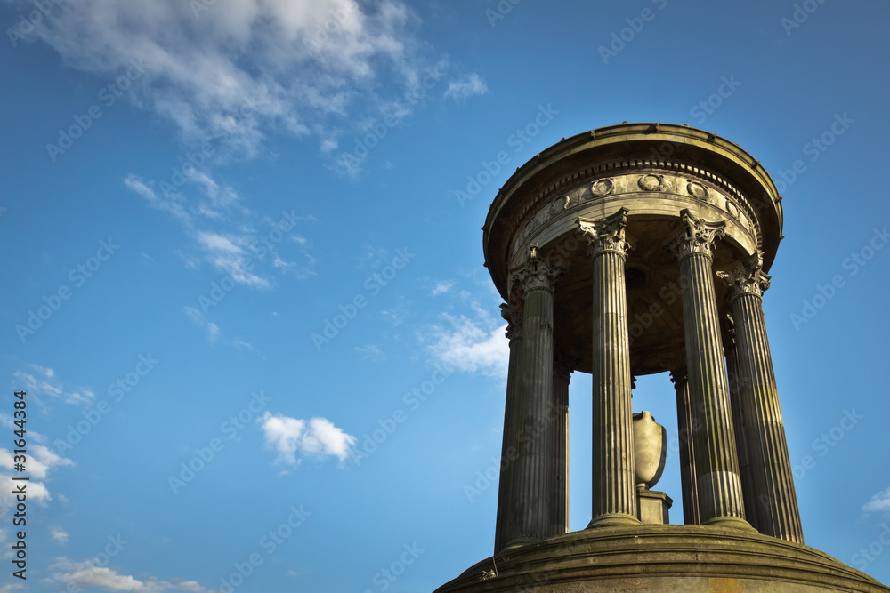 Greek columns monument on bluesky background