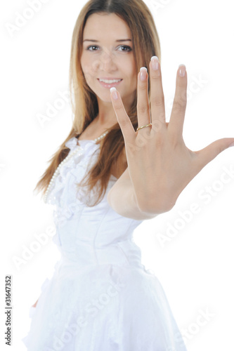 Bride shows ring.