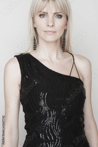 beautiful blond woman in black clothes