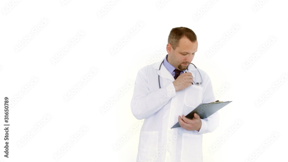doctor writing on clipboard and smiling to the camera, isolated doctor writing on clipboard and smiling to the camera, isolated