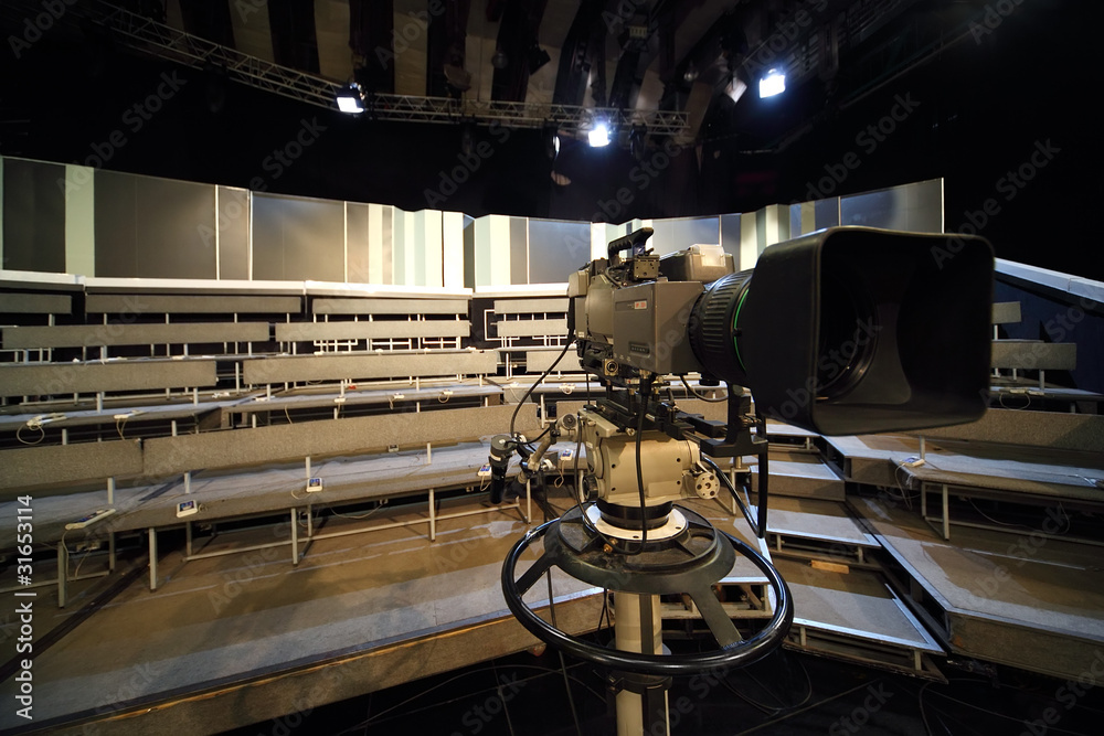 Fotografie professional black video camera in television studio