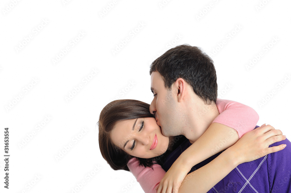 sweet young couple in love having fun. isolated sweet young couple in love having fun. isolated