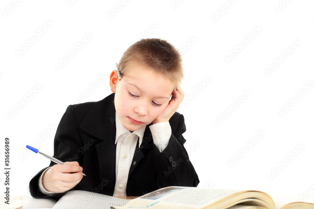 schoolboy sitting in the classroom schoolboy sitting in the classroom