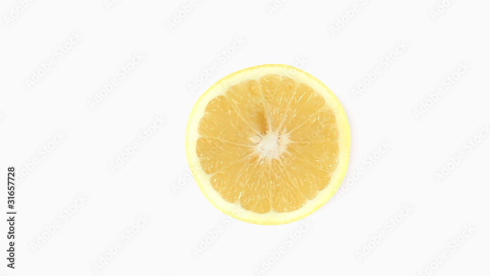 Half yellow lemon turning on itself Half yellow lemon turning on itself