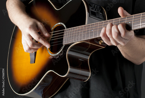 Man playing acoustic guitar