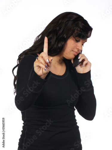 Young woman talking on her cell phone