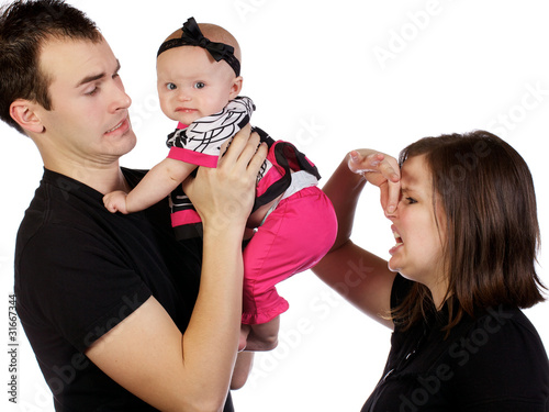 Young couple discovering dirty diaper