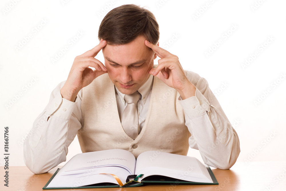 young handsome businessman reading a book on white young handsome businessman reading a book on white