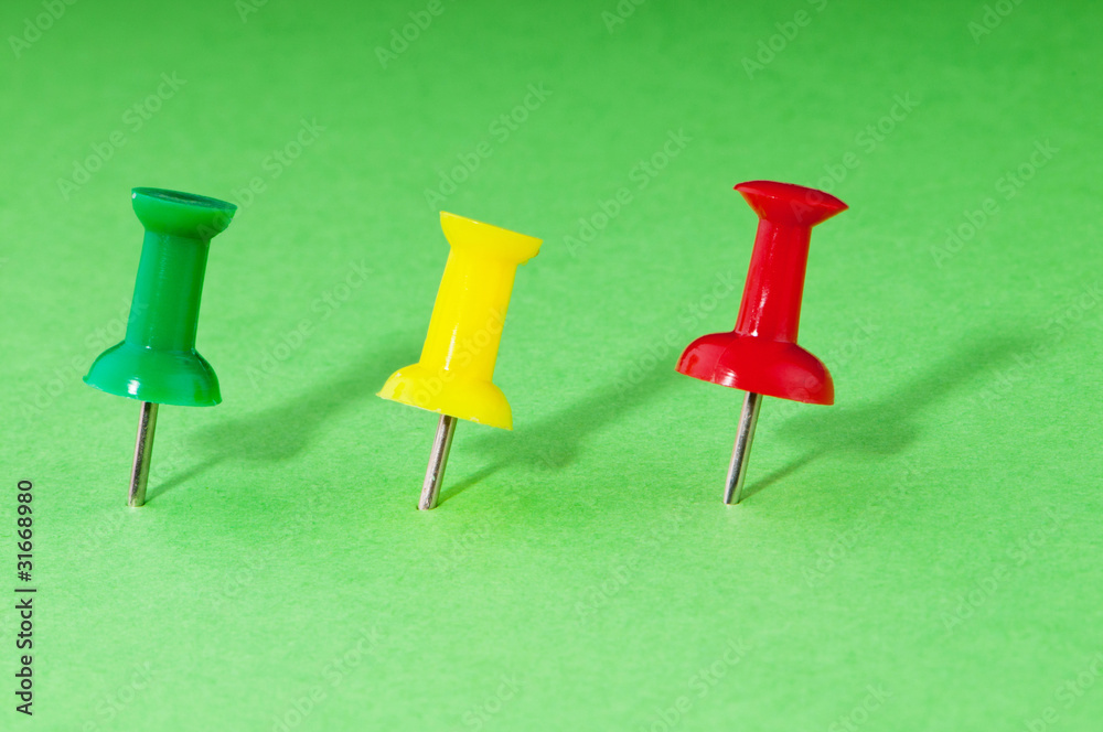 Office pins on the paper Office pins on the paper