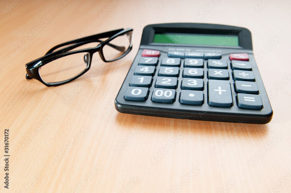 Business concept with accounting calculator Business concept with accounting calculator