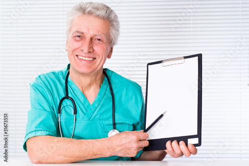 doctor with tethoscope photo