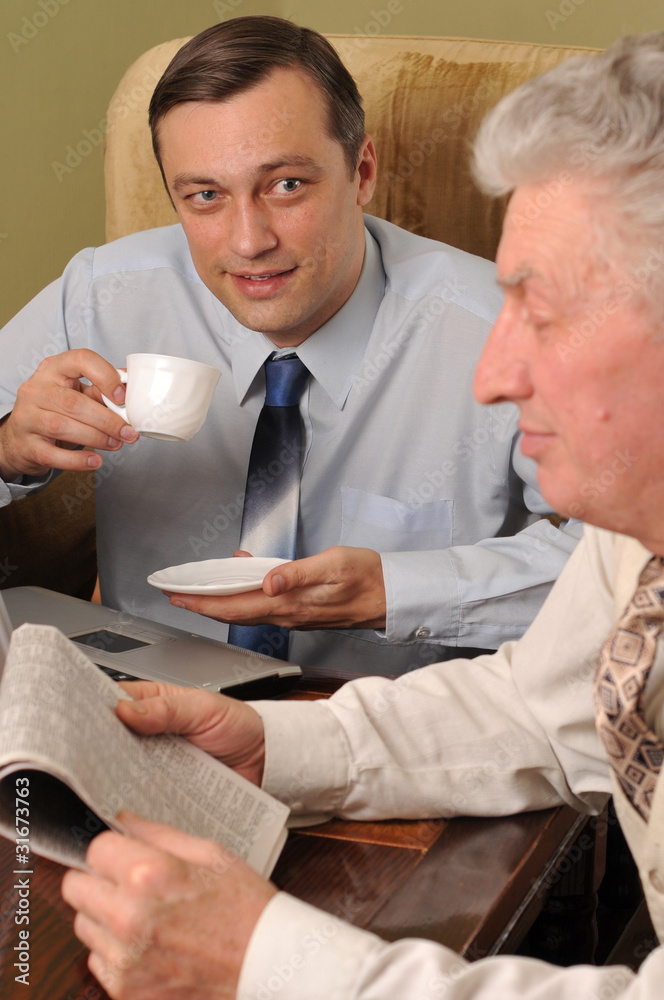 Two handsome businessman  in the office
