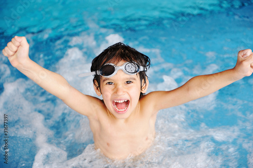 Activities on the pool, children swimming