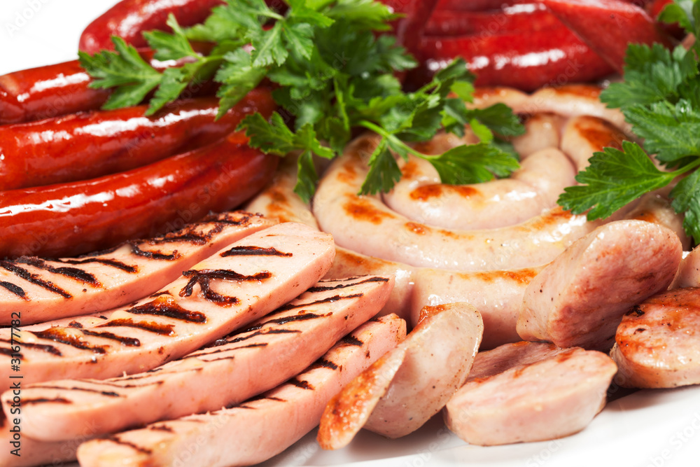 Grilled sausage with sauce and vegetables Grilled sausage with sauce and vegetables