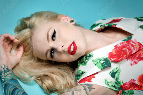 Fotografie Pinup Girl Lying on Floor
