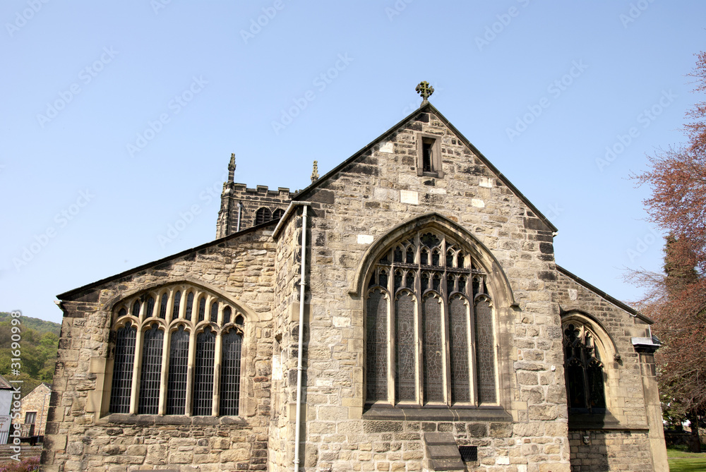 Gable End of All Saints Church Bingley under a blue sky