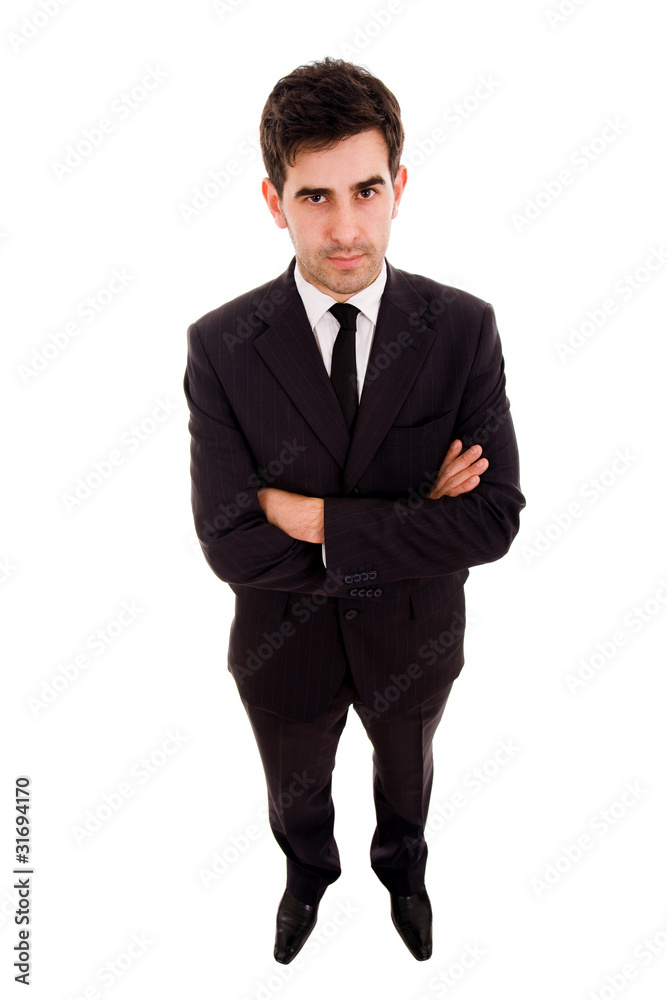 Full length of young business man standing with arms folded over Full length of young business man standing with arms folded over