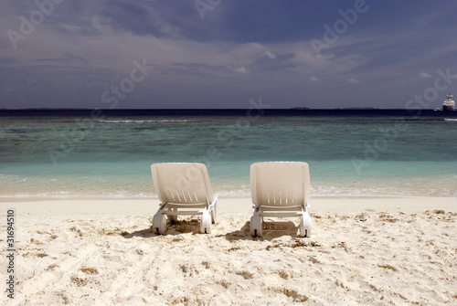 Fototapeta Naklejka Na Ścianę i Meble -  Chairs on the beach