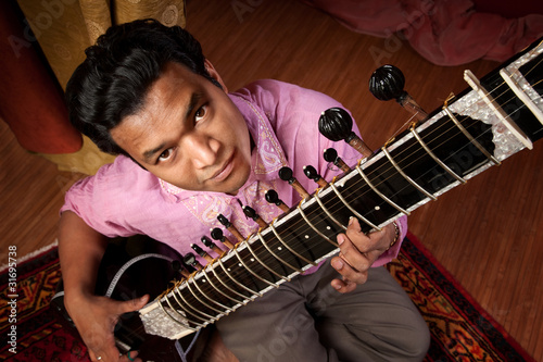 Obraz na płótnie Indian Man Plays a Sitar