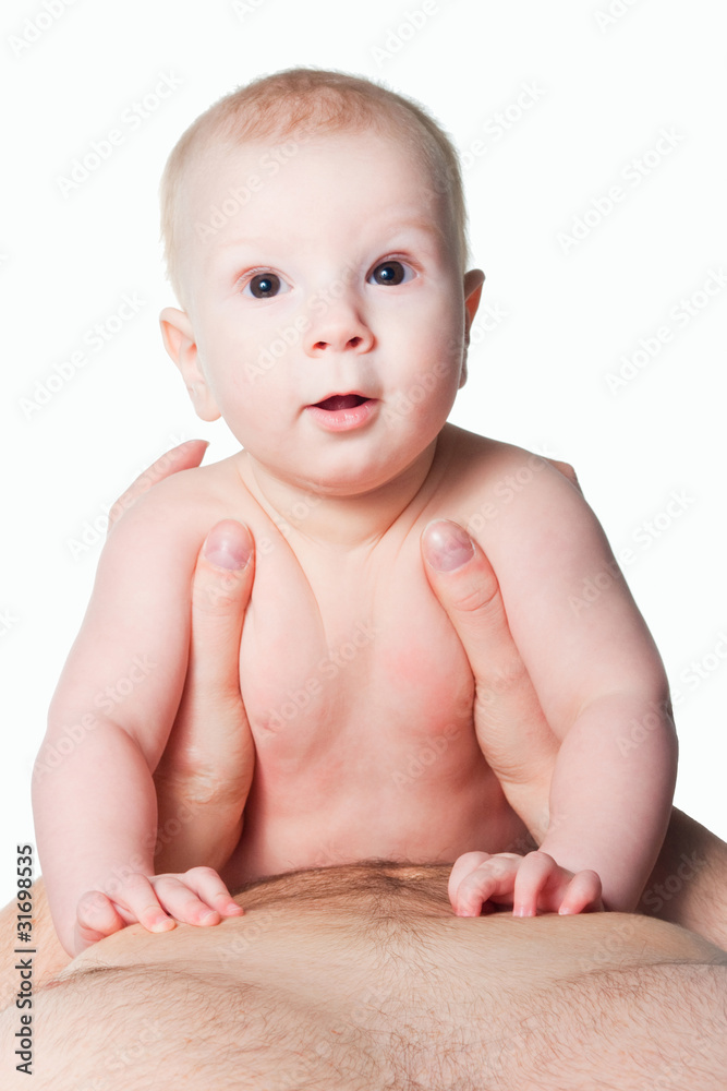 bright picture of baby boy in hands of adult on white bright picture of baby boy in hands of adult on white