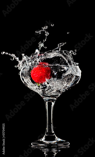 Fresh splashing strawberry