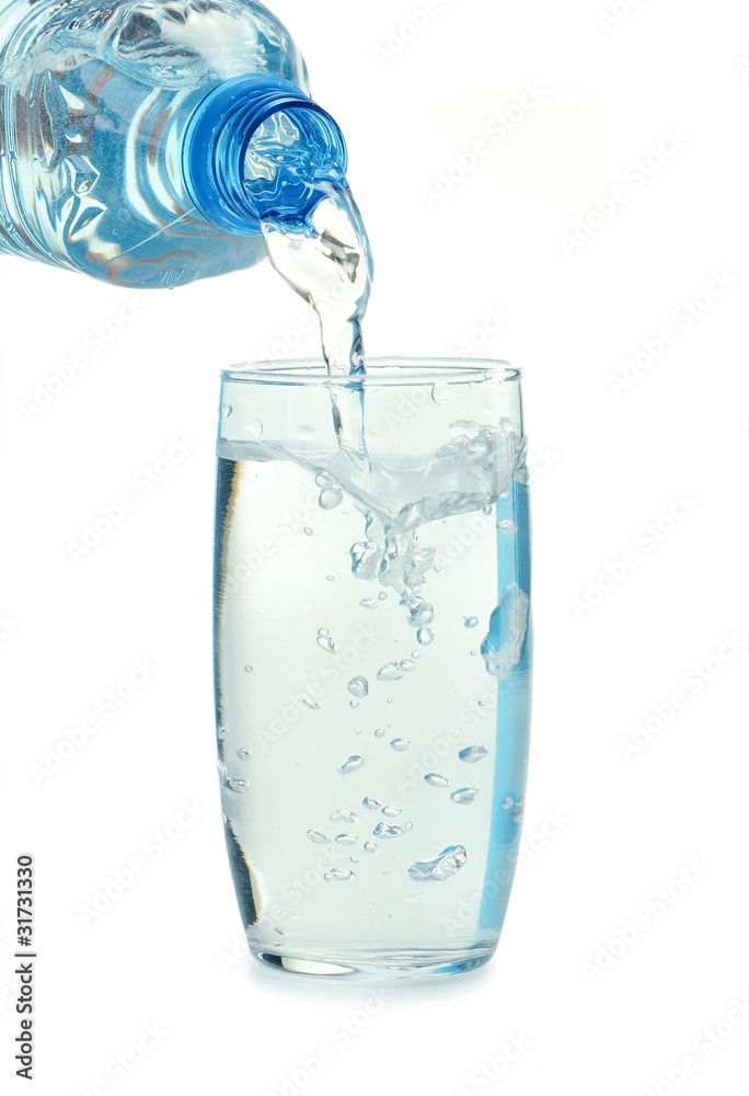 Bottle and glass of water isolated on white Bottle and glass of water isolated on white