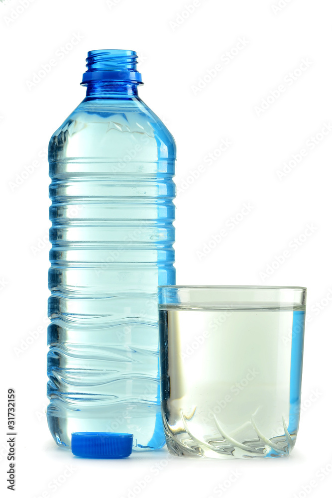 bottle and glass of water isolated on white bottle and glass of water isolated on white