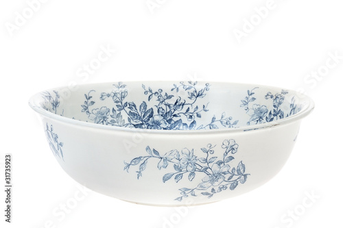 Antique hand painted washbowl isolated on white background