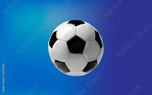 Soccer ball on blue background © Djordje Radivojevic