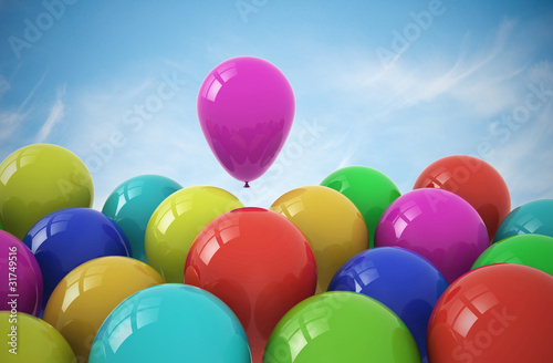 Party balloons on sky background