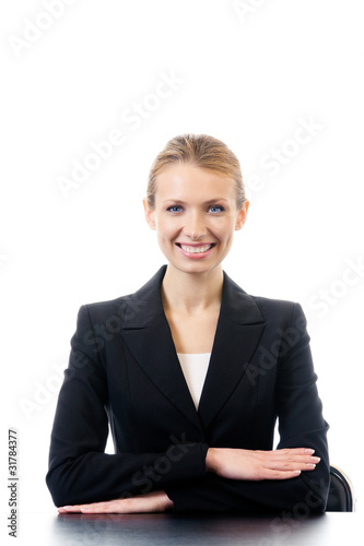 Portrait of businesswoman at workplace, isolated on white